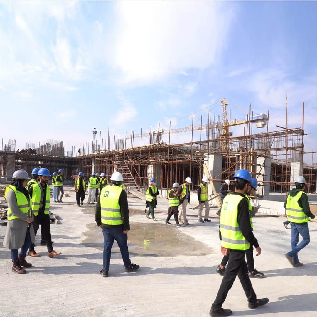 DAE Architecture students supervising construction site